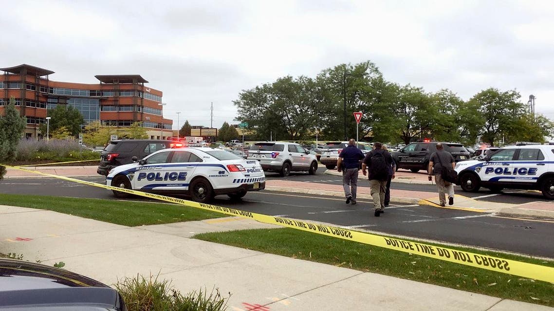 Emergency personnel arrive at the scene where a shooting was reported at a software company in Middleton, Wisconsin, a suburb of Madison, on Wednesday, Sept. 19, 2018. (AP)
