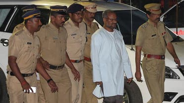 Bishop Franco Mulakkal (2nd R), accused of raping a nun, is escorted by police outside a crime branch office on the outskirts of Kochi in the southern state of Kerala, India, on September 21, 2018. (Reuters)