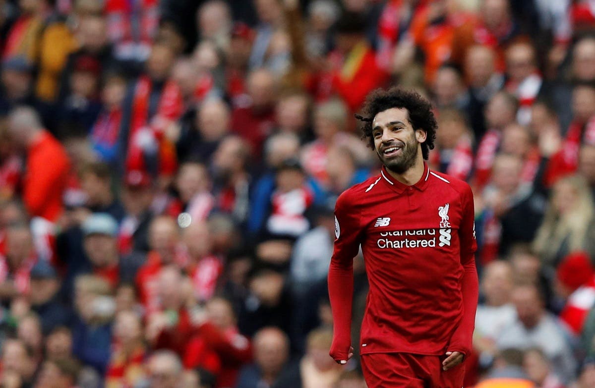  Liverpool's Mohamed Salah celebrates scoring their third goal. (Reuters)