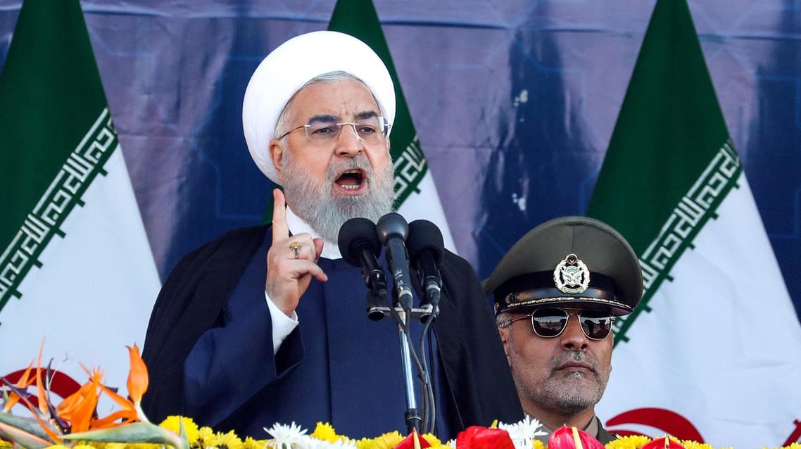 Iranian President Hassan Rouhani delivers a speech during the annual military parade in Tehran on Saturday. (AFP)