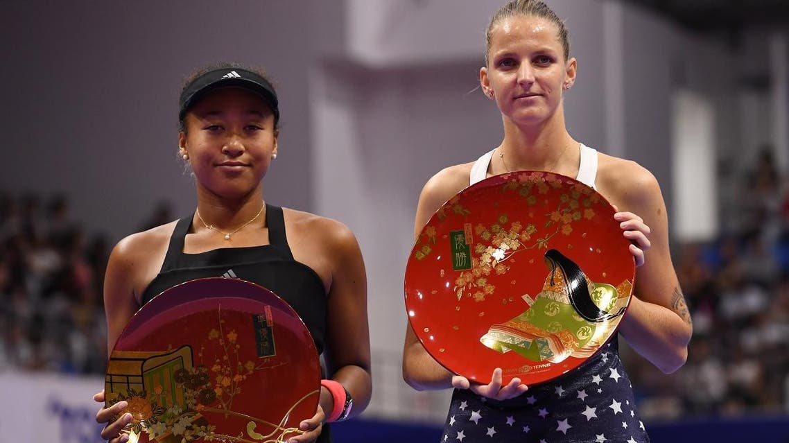 Winner Karolina Pliskova of the Czech Republic (R) and second-placed Japan’s Naomi Osaka pose with their trophies after the women’s singles final at the Pan Pacific Open tennis tournament in Tokyo on September 23, 2018. (AFP)