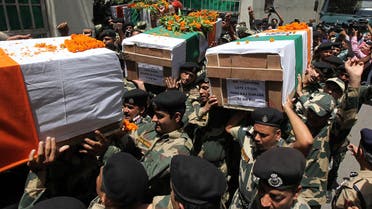 lice Indian police officers carry a coffins of colleagues in Srinagar on August 12, 2018 AFP