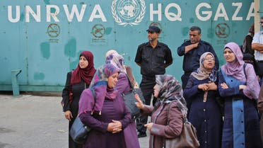 Palestinian employees of UNRWA take part in a protest against job cuts by UNRWA, in Gaza, on September 19, 2018. (AFP)
