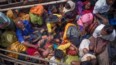 Rohingya refugees arriving by boat at Shah Parir Dwip on the Bangladesh side of the Naf River after fleeing violence in Myanmar on September 12, 2017. (AFP)
