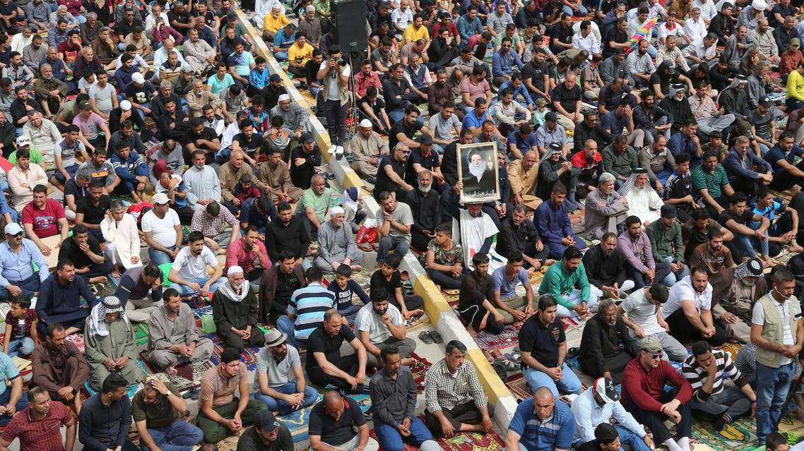Followers of Muqtada al-Sadr attend open-air Friday prayers in Sadr City, Baghdad on March 9, 2018. (AP)