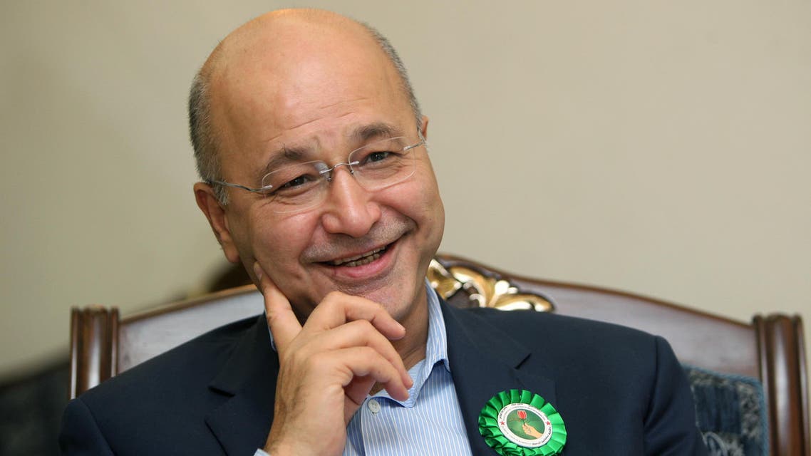 Barham Salih, a senior PUK politician who has held multiple top positions including prime minister of the Kurdish region, answers AFP journalists' questions during an interview on September 18, 2013 in Sulaimaniyah. As Iraqi President Jalal Talabani recovers in Germany from a stroke, his political party at home faces a stiff challenge from an emboldened opposition in upcoming Kurdish elections, with some forecasting a disastrous showing. AFP PHOTO/AHMAD AL-RUBAYE