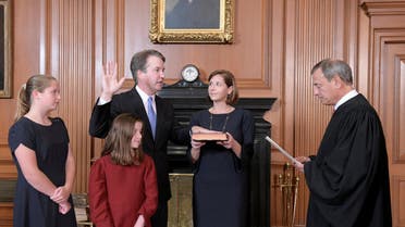 Judge Brett Kavanaugh is sworn in as an Associate Justice of the US Supreme Court by Chief Justice John Roberts at the Supreme Court in Washington. (Reuters)