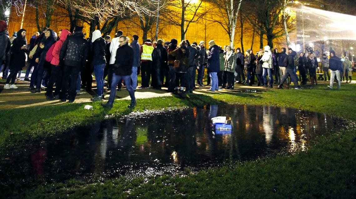 People gather at Maximilien Parc - Maximiliaanpark in Brussels on January 21, 2018, during a demonstration against the Belgian Government's politics on migration. (AFP)