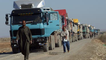 Trucks queue for inspection of goods coming from Iran through al-Shib Port, 145 km from the city of Amara, on December 16, 2009. (File photo: AFP)