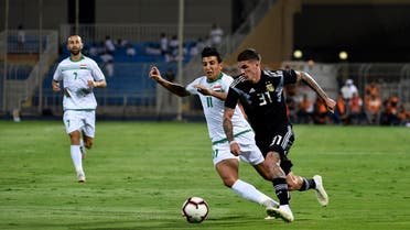 Argentine’s Rodrigo De Paul (R) vies for the ball with Iraqi’s Amjad Kadhim (L) during their International friendly football match in Riyadh on October 11, 2018. (AFP)