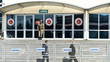 Turkish officers outside courthouse in Silivri district, Istanbul. A trial resumes on terror charges against 17 current and former staff from Cumhuriyet newspaper. (AFP)
