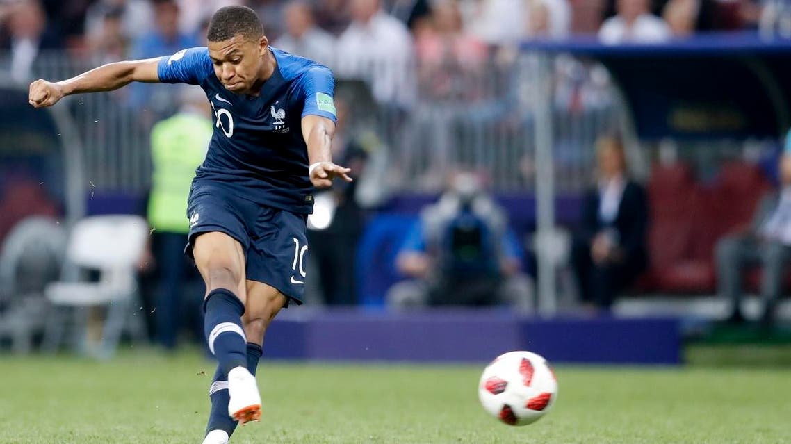 France's Kylian Mbappe scores his side's fourth goal during the final match between France and Croatia at the 2018 soccer World Cup. (AP)