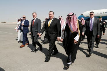  U.S. Secretary of State Mike Pompeo, second right in front, walks with Saudi Foreign Minister Adel al-Jubeir after arriving in Riyadh, Saudi Arabia, Tuesday, Oct. 16, 2018. (AP)