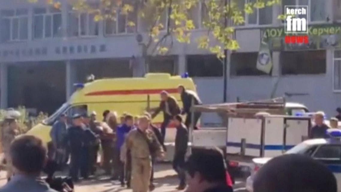 Emergency services carry an injured victim of a blast at at a college in the port city of Kerch, Crimea, in this still image taken from a video on October 17, 2018. (Reuters)