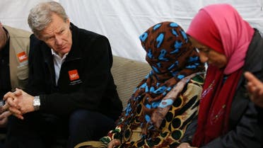 File photo of Jan Egeland, UN humanitarian adviser (left), meets with Syrian refugees at a camp in the town of Marej in the Bekaa valley, east Lebanon. (AP)