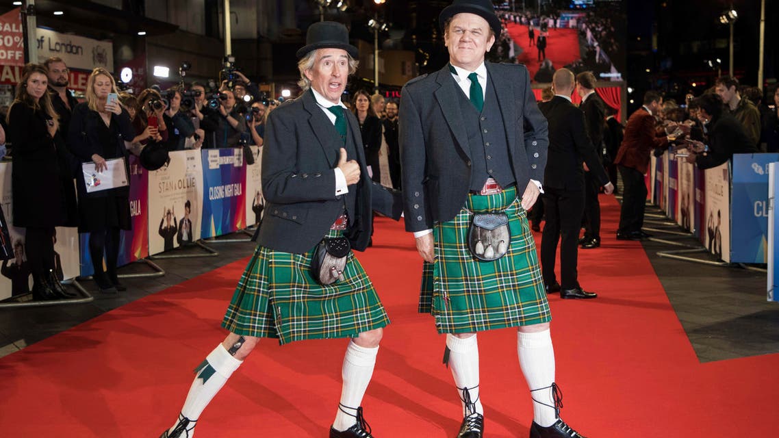 Actors Steve Coogan, left, and John C. Reilly pose for photographers upon arrival at the premiere of ‘Stan and Ollie’ at BFI London Film Festival on Oct. 21, 2018. (AP)