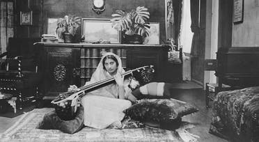 This handout picture received from Shrabani Basu at the Noor Inayat Khan Memorial trust on November 8, 2012 shows Noor Inayat Khan playing a Veena. (AFP)