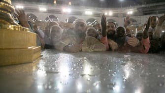 IN PICTURES: Pilgrims perform Umrah as rain falls on Makkah's Grand Mosque 