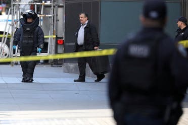 A member of the New York Police Department bomb squad is pictured outside the Time Warner Center in the Manhattan borough of New York City after a suspicious package was found inside the CNN Headquarters in New York. (Reuters)