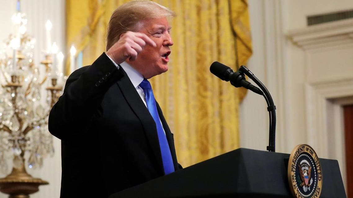 US President Donald Trump talks about the arrest of a bombing suspect sought in connection with packages sent to Democratic political figures during an event in the East Room of the White House in Washington, on October 26, 2018. (Reuters)