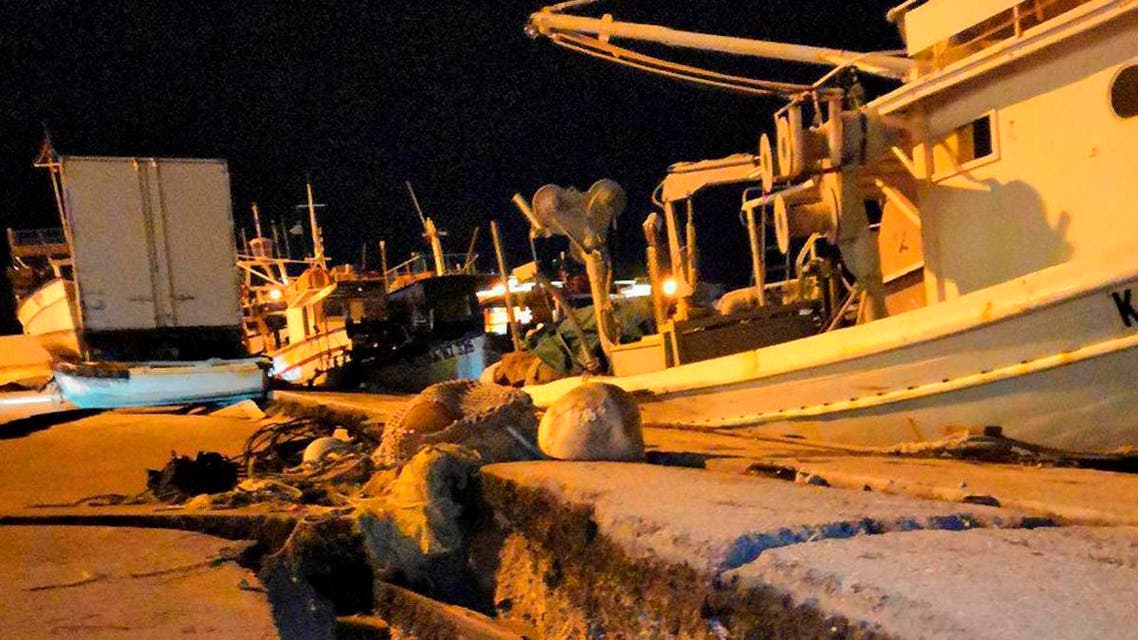 Damages are seen at the port of the western island of Zakynthos, Greece. (AP)
