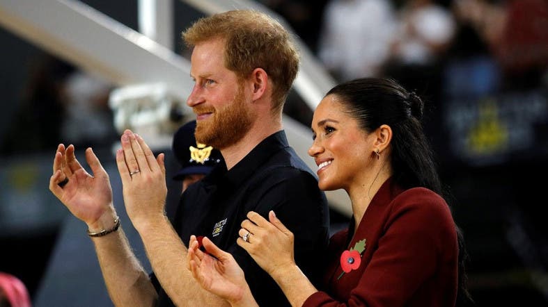 Prince Harry and wife Meghan attend final day of Invictus Games in ...