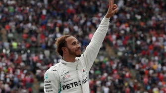 Britain’s Hamilton celebrates fifth F1 title as Verstappen wins in Mexico