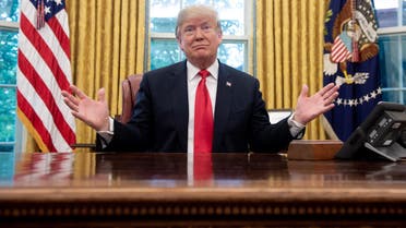 (FILES) In this file photo taken on October 10, 2018 US President Donald Trump speaks during a briefing on Hurricane Michael in the Oval Office of the White House in Washington, DC. President Donald Trump kept up the pressure on Mexico October 31, 2018 to halt groups of migrants heading to the American border, as the US enters the final stretch of campaigning before key midterm elections. Trump has sought to put immigration front and center ahead of next week's hotly-contested vote, ordering thousands of troops to the southern border and threatening to end automatic citizenship for US-born children of immigrants.
