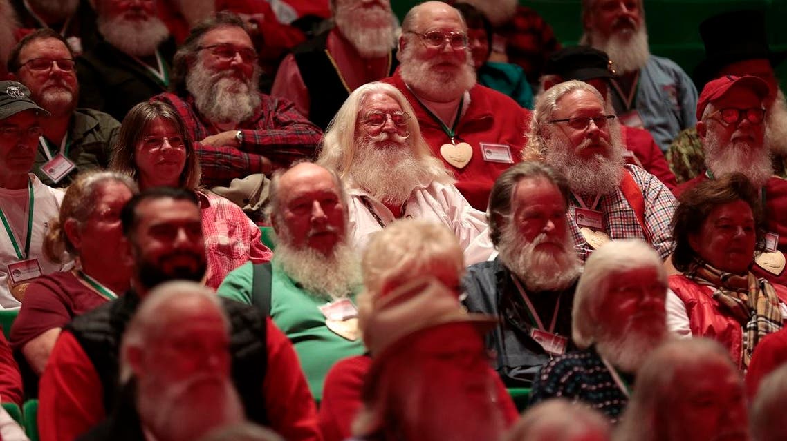 Participants at Santa School pose for a group photo in Midland, Michigan. (Reuters)