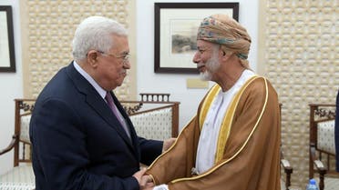 Omani minister Yusuf al-Alawi and Mahmoud Abbas. (AFP)