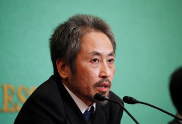 Jumpei Yasuda, the Japanese journalist held in Syria for more than three years, addresses a news conference for the first time since his release last month, at the Japan National Press Club in Tokyo. (Reuters)