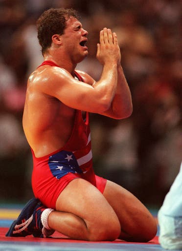 Kurt Angle of the United States reacts to his gold medal win in the 100 kg class of freestyle wrestling at the Centennial Olympic Games in Atlanta Wednesday July 31, 1996. (AP)
