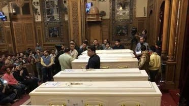 coptic christians bury dead after terrorist attack in Egypt (Supplied)