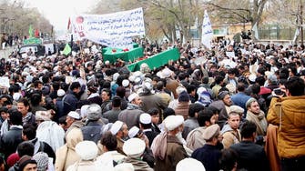 Afghan Shiite militia battles Taliban, raising sectarian fears
