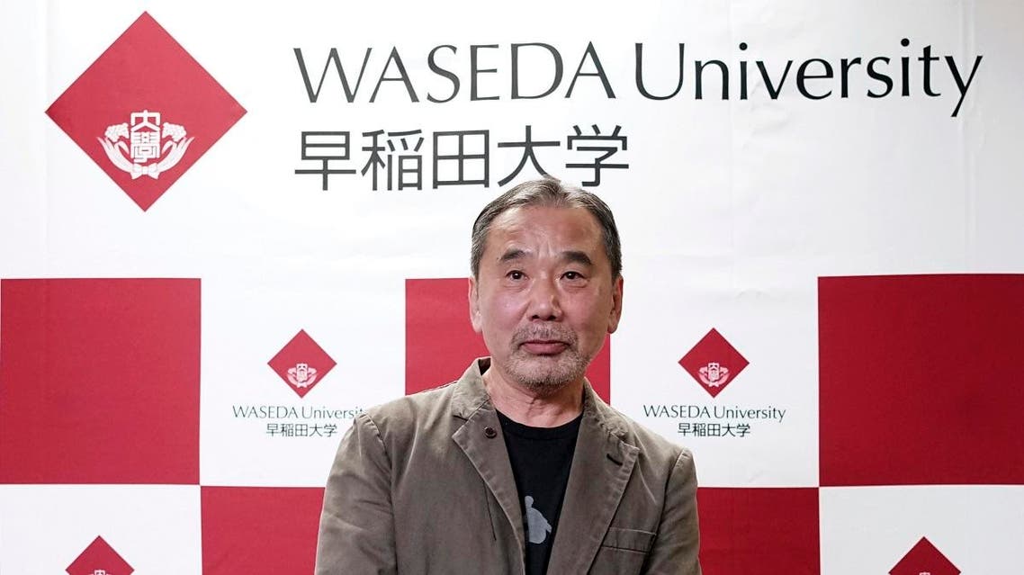 Japanese novelist Haruki Murakami poses for photographers during a press conference at Waseda University in Tokyo. (AP)