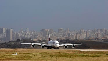 A double-decker Airbus A380 plane lands at the Rafik Hariri International Airport in Beirut, Lebanon, Thursday, March 29, 2018. An Emirates Airline superjumbo jet has landed at Beirut's international airport as Lebanon looks to sustain a revival of its tourism industry. It is the first revenue A380 flight to the country. (AP Photo/Bilal Hussein)