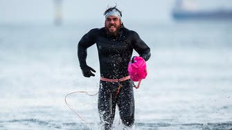 Adventurer Edgley becomes first man to swim around Britain