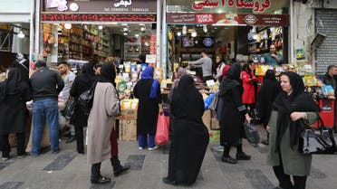 Iranians shop at the grand bazar in Tehran on November 3, 2018. (AFP)