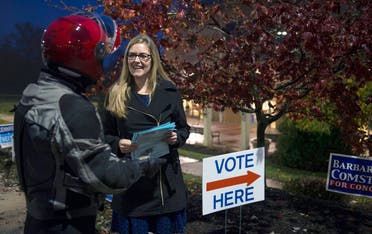 Virginia Democratic congressional candidate Jennifer Wexton, a former prosecutor and current Democratic state senator, greets voters at Ida Lee Park on, Tuesday, Nov. 6, 2018 in Leesburg, Va. (AP)