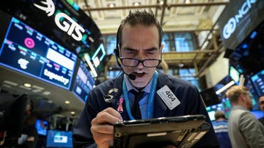 Traders work on the floor of the New York Stock Exchange (NYSE) in New York. (Reuters)