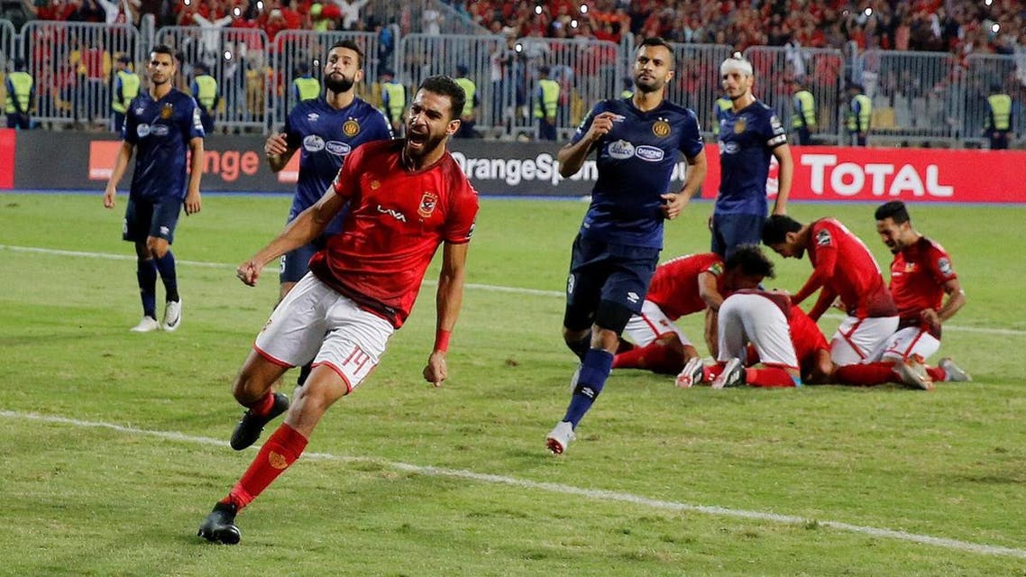 Al Ahly's Amr Al Sulaya celebrates after teammate Walid Soliman scores their third goal. (Reuters)