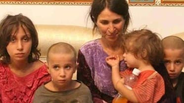 One of the kidnapped woman of the Sweida with her children. (Supplied)
