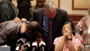 Lisa Berry, right, is comforted by attorney Robert Mongeluzzi while Kyrie Rose is comforted by a family member following a news conference regarding the July 19 duck boat accident, Tuesday, July 31, 2018, in Indianapolis. (AP)