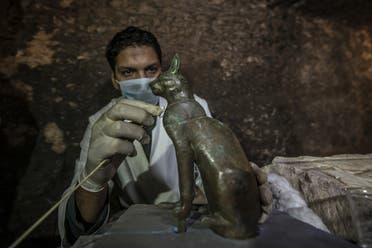 Egypt bronze ancient sitting cat statue  (AFP)