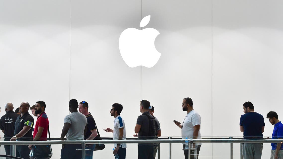Customers stand in line to purchase the new Apple iPhone 8 at Dubai Mall Apple Store in Dubai (File Photo: AFP)