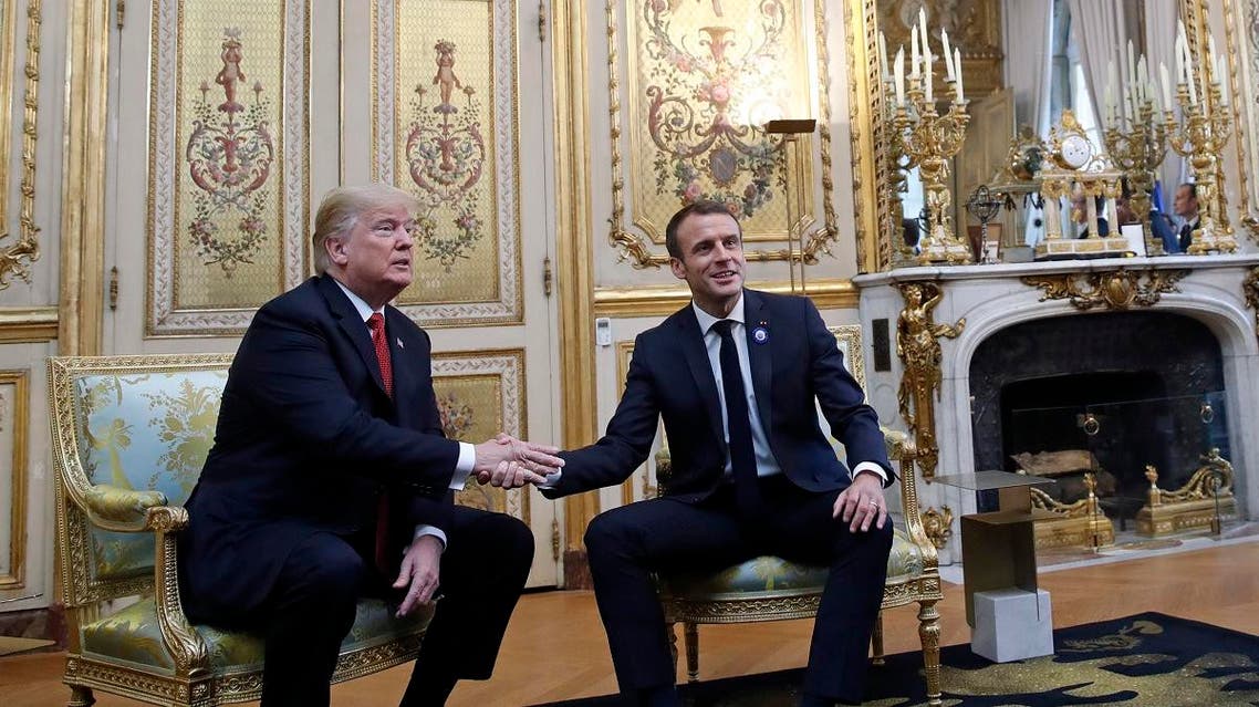 Trump in France Macron (AP)