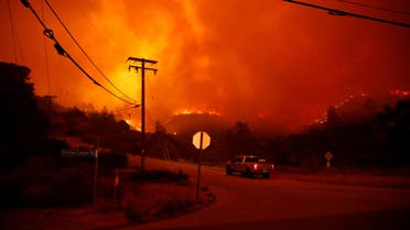 The Woosley Fire burns in Malibu, California, U.S. November 9, 2018. REUTERS/Eric Thayer