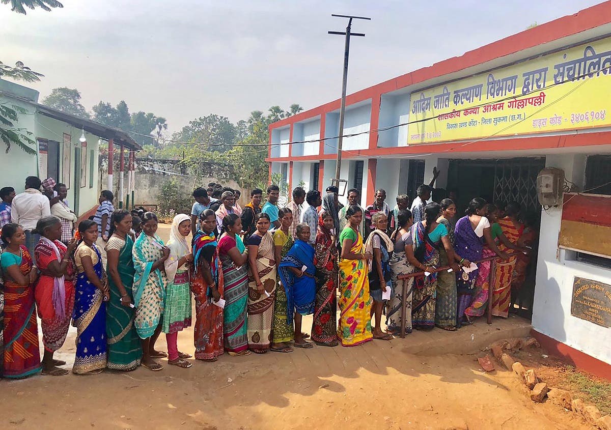 Indian voters line up to vote at a polling station in Sukma in Chhattisgarh state on November 12, 2018. (AFP)