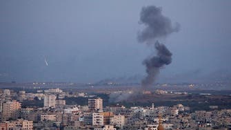 Israel kills Hamas militant, delays Qatari cash after Gaza flare-up