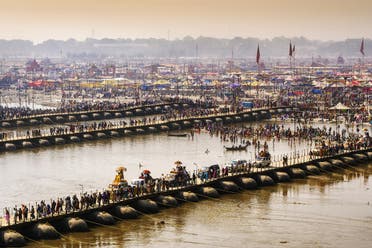Kumbh Mela festival in Allahabad, Uttar Pradesh, India, crowd crossing pontoon bridges over the Ganges river. (Shutterstock)